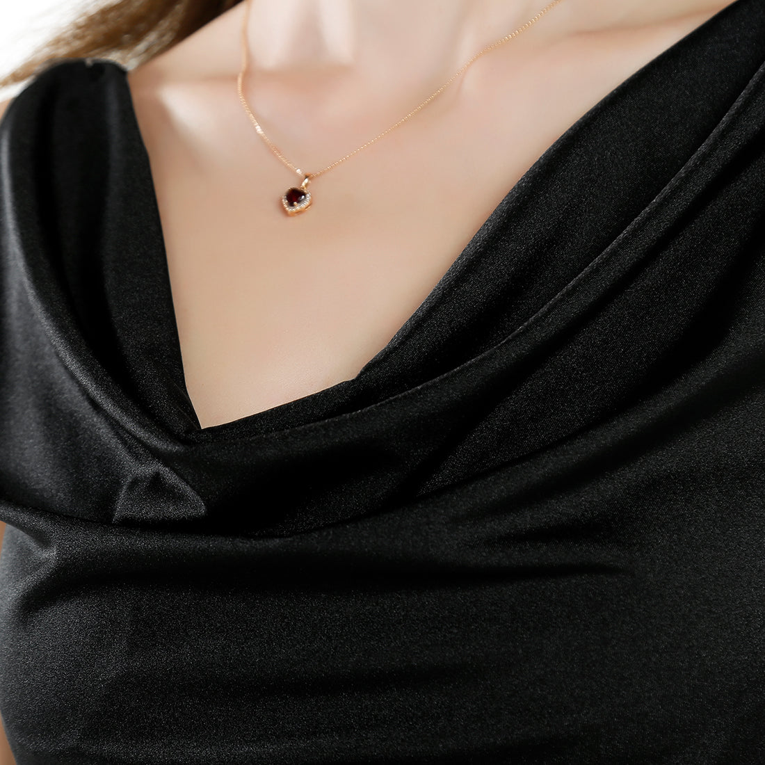 sleeveless draped knee length dress#color_black