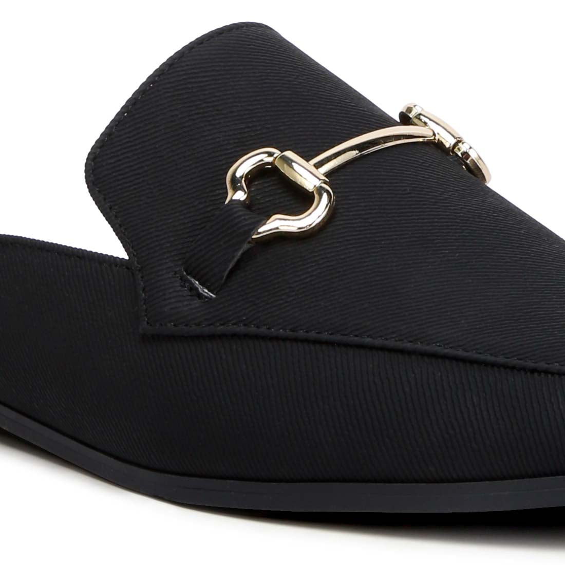horsebit embellishment slip on mules#color_black